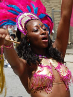 Masquerader on the road at Downtown Parade
